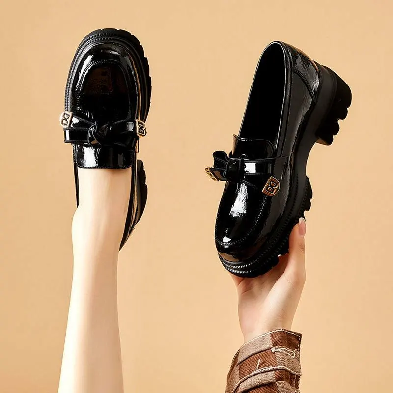 Black patent platform loafers
