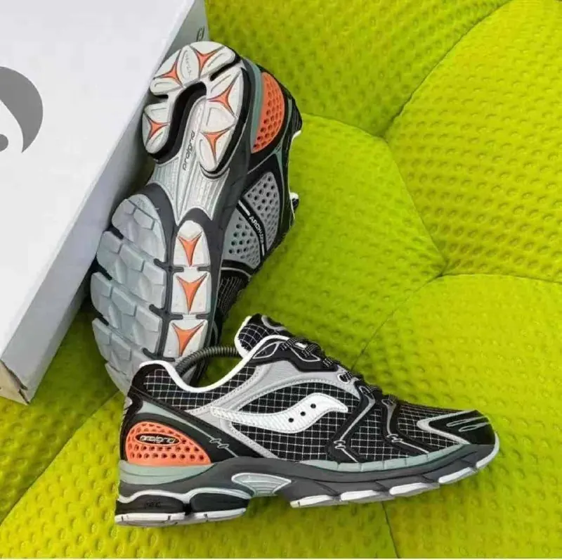 Black and orange running sneakers